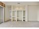 Built in shelving unit with ample storage space at 9514 E Cavalry Dr, Scottsdale, AZ 85262
