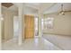 Bright and spacious entryway with tile flooring at 9514 E Cavalry Dr, Scottsdale, AZ 85262