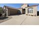 One-story home with tile roof, attached garage, and desert landscaping at 9514 E Cavalry Dr, Scottsdale, AZ 85262