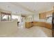 Open concept kitchen with a breakfast bar and views to the Gathering room at 9514 E Cavalry Dr, Scottsdale, AZ 85262