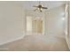 Living room with view of hallway and tile floor at 9514 E Cavalry Dr, Scottsdale, AZ 85262