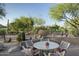 Charming patio furniture with scenic golf course views at 9514 E Cavalry Dr, Scottsdale, AZ 85262