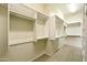 Large walk-in closet with ample shelving and hanging space at 9514 E Cavalry Dr, Scottsdale, AZ 85262