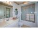 Bathroom with single sink vanity, shower and toilet at 9614 N 110Th Ave, Sun City, AZ 85351