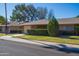 Single-story home with a well-manicured lawn and attached garage at 9614 N 110Th Ave, Sun City, AZ 85351