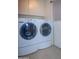 Convenient laundry room with side-by-side washer and dryer at 9614 N 110Th Ave, Sun City, AZ 85351