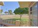 View of backyard and golf course from window at 10529 W Pineaire Dr, Sun City, AZ 85351