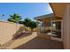 Side yard with screened porch and citrus tree at 10529 W Pineaire Dr, Sun City, AZ 85351