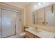 Clean bathroom with a shower/tub combo and updated vanity at 10529 W Pineaire Dr, Sun City, AZ 85351