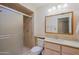 Bathroom with shower, toilet and updated vanity at 10529 W Pineaire Dr, Sun City, AZ 85351