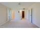 Bright bedroom with access to a bathroom and large closet at 10529 W Pineaire Dr, Sun City, AZ 85351