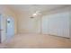 Spacious bedroom with double closets and neutral decor at 10529 W Pineaire Dr, Sun City, AZ 85351