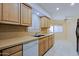 Clean kitchen featuring ample counter space and a tiled floor at 10529 W Pineaire Dr, Sun City, AZ 85351