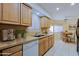 Well-equipped kitchen featuring ample cabinetry and counter space at 10529 W Pineaire Dr, Sun City, AZ 85351