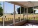 Relaxing screened porch overlooking a golf course at 10529 W Pineaire Dr, Sun City, AZ 85351