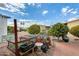 Charming backyard with raised garden beds and citrus trees at 11596 W Sierra Dawn Blvd # 134, Surprise, AZ 85378