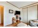 Bedroom with TV stand, closet, and comfortable seating area at 11596 W Sierra Dawn Blvd # 134, Surprise, AZ 85378