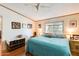 Spacious bedroom with large bed, ceiling fan, and ample natural light at 11596 W Sierra Dawn Blvd # 134, Surprise, AZ 85378