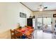 Bright dining area with table and chairs, and access to backyard patio at 11596 W Sierra Dawn Blvd # 134, Surprise, AZ 85378