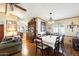 Bright dining room with hardwood floors and a charming wooden hutch at 11596 W Sierra Dawn Blvd # 134, Surprise, AZ 85378