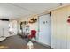 Enclosed patio with seating and access to exterior entry at 11596 W Sierra Dawn Blvd # 134, Surprise, AZ 85378