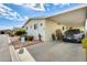 Front view of manufactured home with carport and landscaping at 11596 W Sierra Dawn Blvd # 134, Surprise, AZ 85378