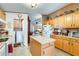 Kitchen with island, laundry, and pantry at 11596 W Sierra Dawn Blvd # 134, Surprise, AZ 85378
