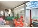 Covered patio with seating, hot tub, and lush potted plants at 11596 W Sierra Dawn Blvd # 134, Surprise, AZ 85378