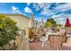 Outdoor patio with seating, umbrella, and a spacious layout at 11596 W Sierra Dawn Blvd # 134, Surprise, AZ 85378