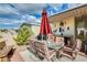 Enjoy the spacious patio with dining set and shade umbrella at 11596 W Sierra Dawn Blvd # 134, Surprise, AZ 85378