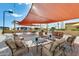 Community patio with shaded seating areas at 11596 W Sierra Dawn Blvd # 134, Surprise, AZ 85378