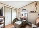 Cozy sitting room with comfortable armchair and large window at 11596 W Sierra Dawn Blvd # 134, Surprise, AZ 85378