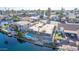 Aerial view of a waterfront home with private dock and pool at 1412 E Commodore Pl, Tempe, AZ 85283