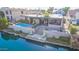 Aerial view of house, pool, and private dock on waterfront at 1412 E Commodore Pl, Tempe, AZ 85283