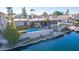 Aerial view of single story home with pool and canal access at 1412 E Commodore Pl, Tempe, AZ 85283