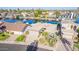 Mid-century modern home with canal views and landscaping at 1412 E Commodore Pl, Tempe, AZ 85283