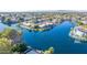 Wide aerial view of a waterfront property and neighborhood at 1412 E Commodore Pl, Tempe, AZ 85283