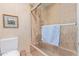 Bathroom with shower/tub combo and tile surround at 1412 E Commodore Pl, Tempe, AZ 85283