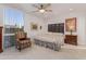 Bright bedroom with king-size bed and built-in shelving at 1412 E Commodore Pl, Tempe, AZ 85283