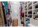 Large walk-in closet with ample shelving and hanging space at 1412 E Commodore Pl, Tempe, AZ 85283
