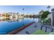 Relaxing waterfront dock view with potted plants and seating at 1412 E Commodore Pl, Tempe, AZ 85283
