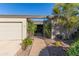 Elegant entryway with an ornate gate and well-manicured landscaping at 1412 E Commodore Pl, Tempe, AZ 85283