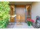 Inviting entryway with a wood door and tiled flooring at 1412 E Commodore Pl, Tempe, AZ 85283