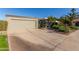 Mid-century modern home with a landscaped front yard at 1412 E Commodore Pl, Tempe, AZ 85283