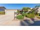Mid-century modern home with a landscaped front yard at 1412 E Commodore Pl, Tempe, AZ 85283
