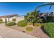 Mid-century modern home with a landscaped front yard at 1412 E Commodore Pl, Tempe, AZ 85283