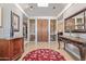 Bright foyer with a large mirror and decorative rug at 1412 E Commodore Pl, Tempe, AZ 85283