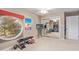 Home gym with mirrored wall and exercise equipment at 1412 E Commodore Pl, Tempe, AZ 85283