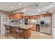 Spacious kitchen with granite countertops and stainless steel appliances at 1412 E Commodore Pl, Tempe, AZ 85283