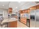 Updated kitchen with granite countertops and stainless steel appliances at 1412 E Commodore Pl, Tempe, AZ 85283